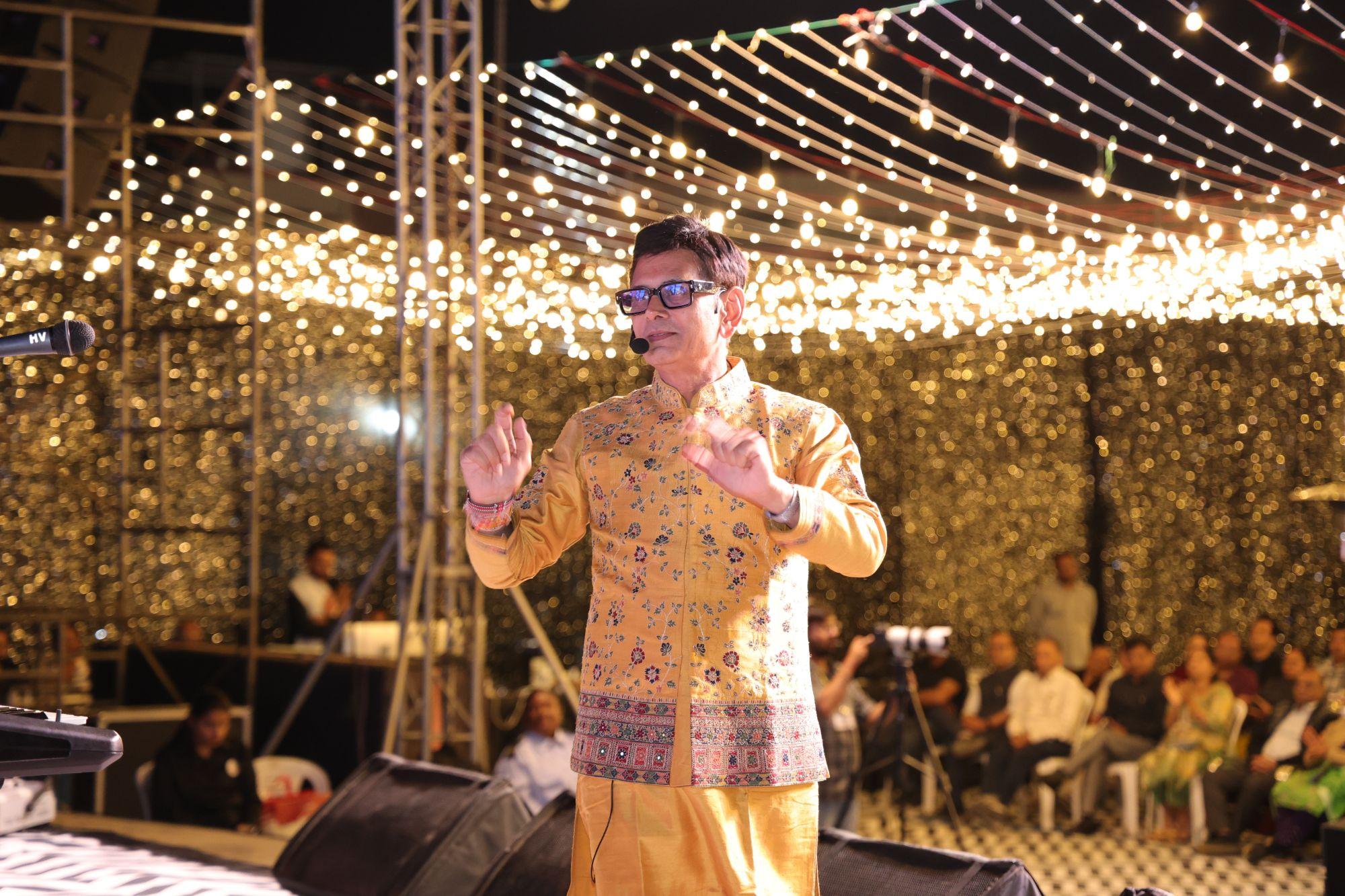 Live on stage under a canopy of string lights